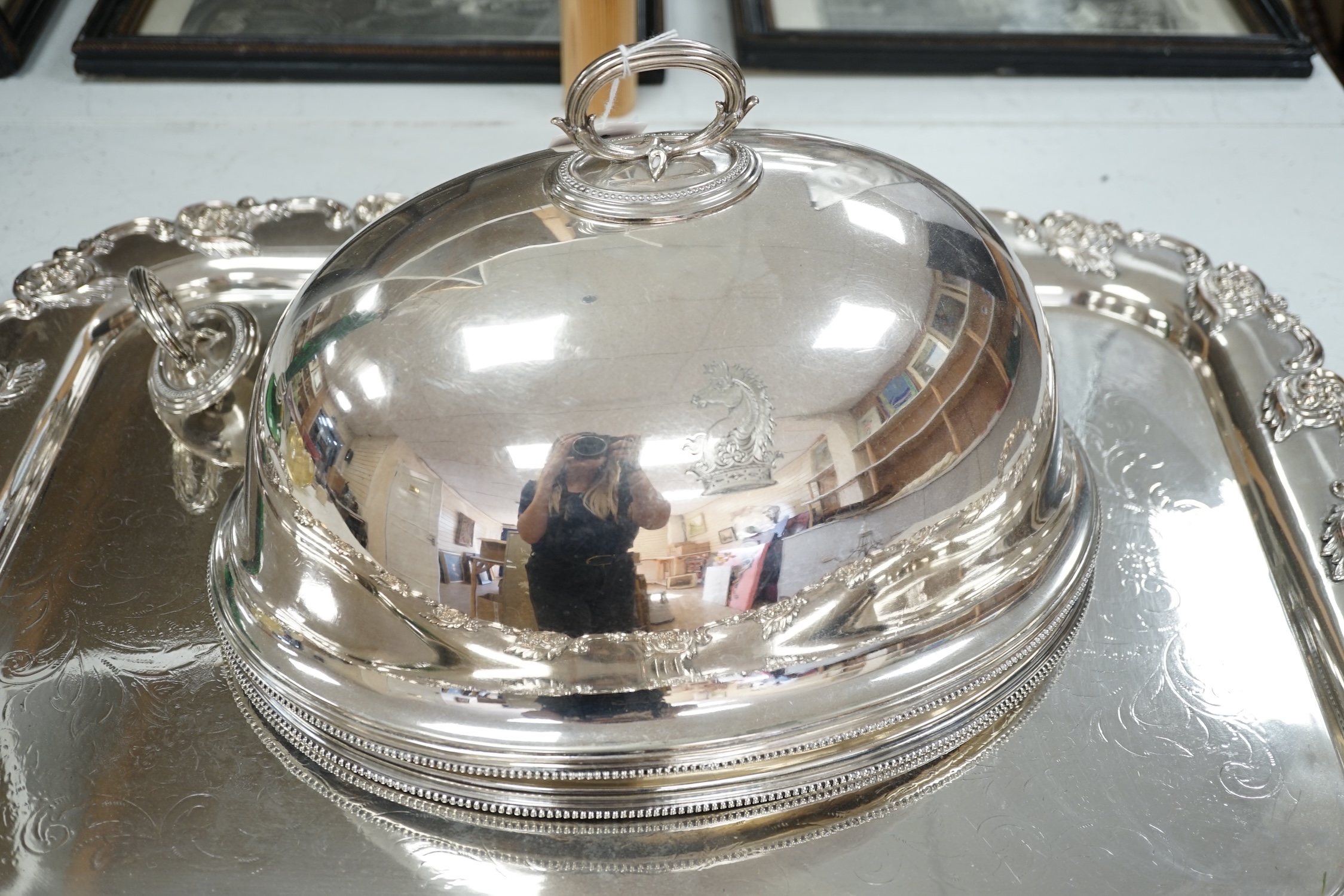 A pair of Victorian electroplate meat domes and a large two handled tray, tray 76cm wide including handles. Condition - good